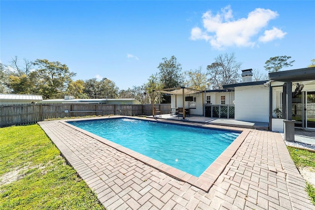 view of pool featuring a patio area, a fenced backyard, and a fenced in pool