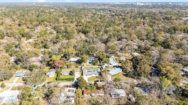 aerial view featuring a view of trees