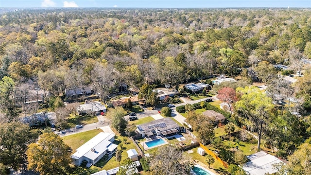 bird's eye view featuring a view of trees