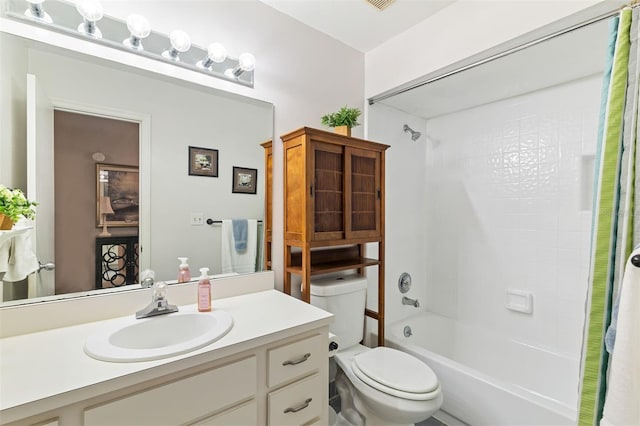 bathroom with shower / tub combo, visible vents, vanity, and toilet