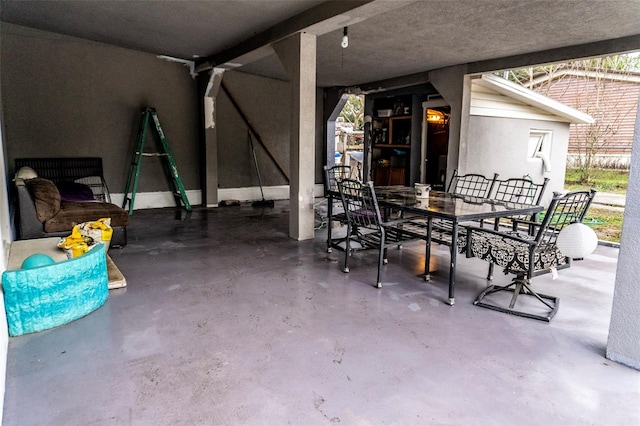 view of patio featuring outdoor dining area