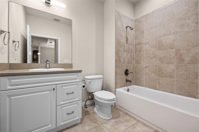 full bathroom with toilet, shower / bath combination, visible vents, vanity, and tile patterned floors