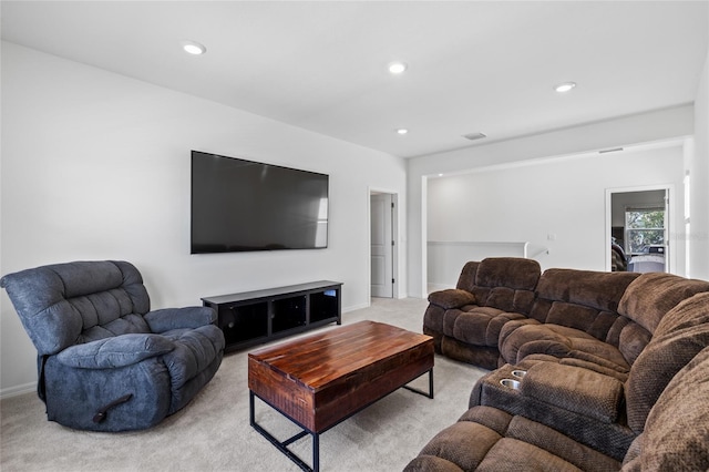 living area featuring light carpet, baseboards, visible vents, and recessed lighting