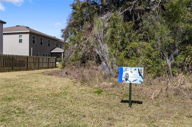 view of yard with fence