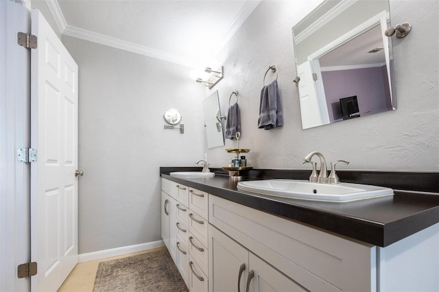 bathroom featuring double vanity, a sink, and ornamental molding