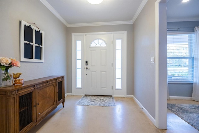 entrance foyer with ornamental molding, finished concrete floors, and plenty of natural light