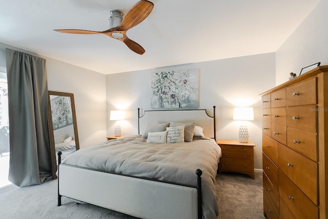 bedroom featuring a ceiling fan and light colored carpet