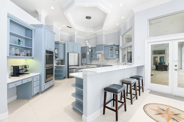 kitchen featuring stainless steel appliances, french doors, a peninsula, and open shelves