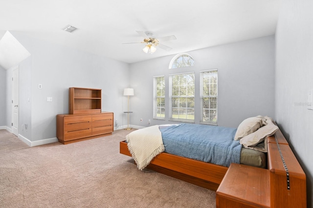 bedroom featuring ceiling fan, carpet flooring, visible vents, and baseboards