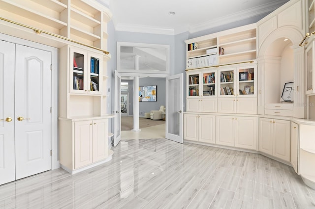 mudroom featuring ornamental molding