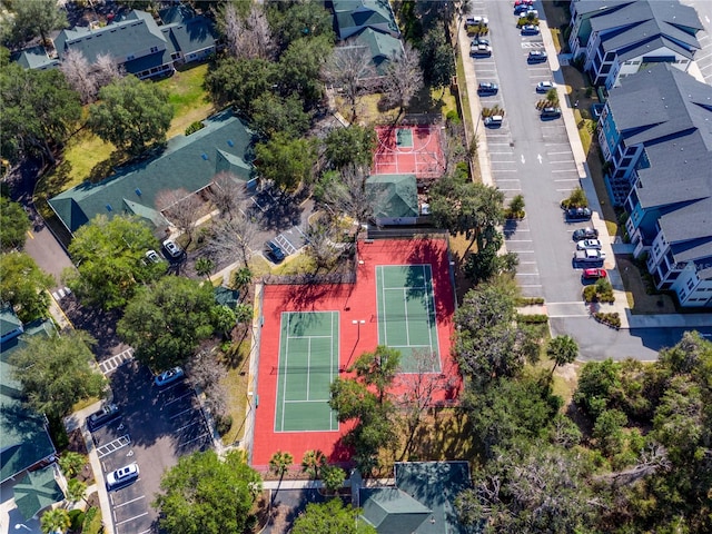 birds eye view of property with a residential view