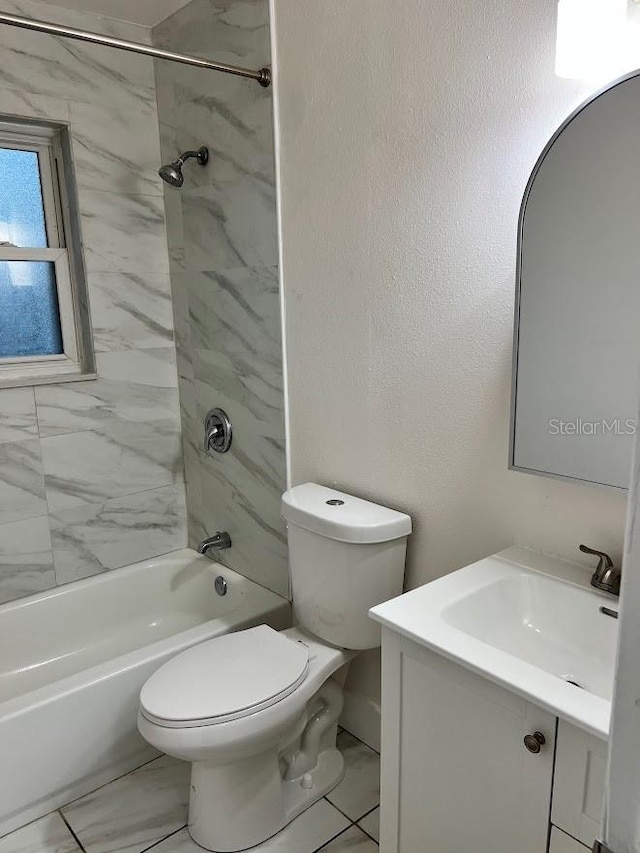 full bath featuring toilet, shower / tub combination, a textured wall, marble finish floor, and vanity