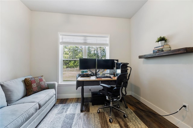 office featuring wood finished floors and baseboards