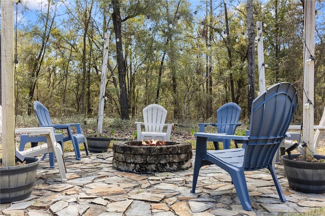 view of patio / terrace featuring a fire pit