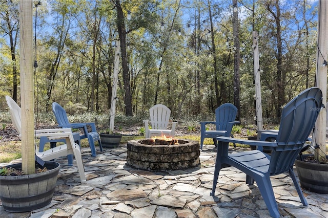 view of patio / terrace with a fire pit