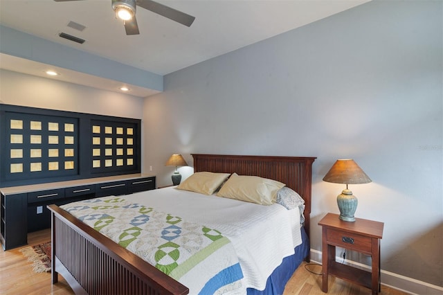 bedroom with visible vents, baseboards, a ceiling fan, light wood-style flooring, and recessed lighting