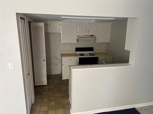 kitchen featuring range with electric cooktop, white cabinets, a peninsula, light countertops, and under cabinet range hood