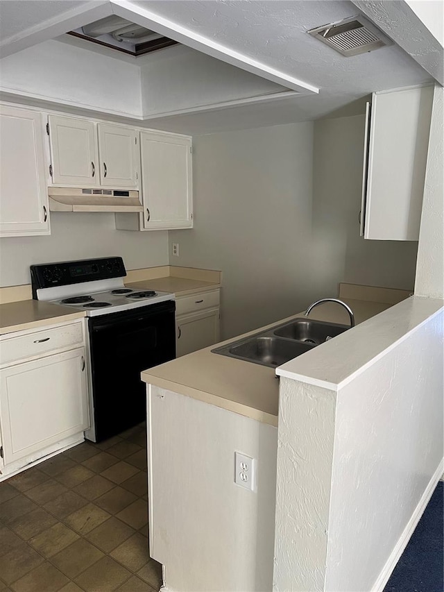 kitchen featuring under cabinet range hood, electric range, a sink, visible vents, and white cabinets