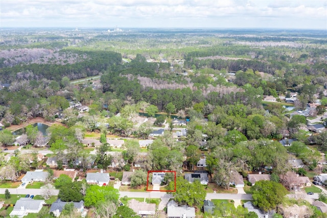 aerial view with a wooded view