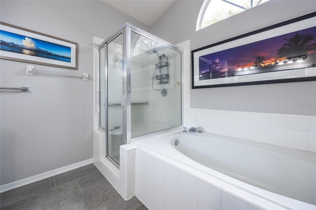 full bathroom with tile patterned floors, baseboards, a stall shower, and a bath