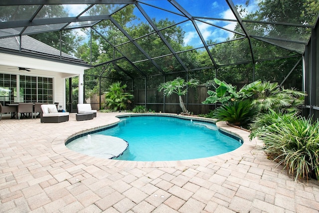 view of pool with a fenced in pool, outdoor lounge area, a patio, and fence