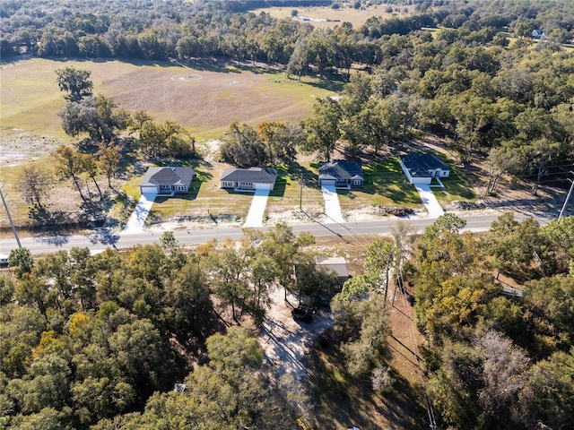 aerial view with a forest view and a rural view