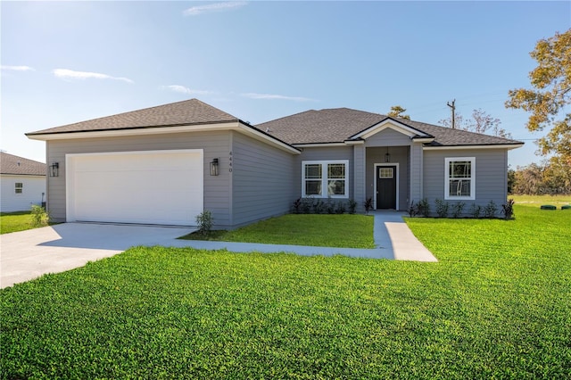 ranch-style house with an attached garage, a shingled roof, a front lawn, and concrete driveway