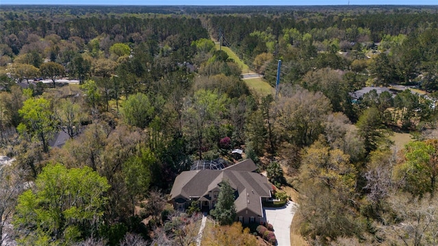 aerial view with a wooded view