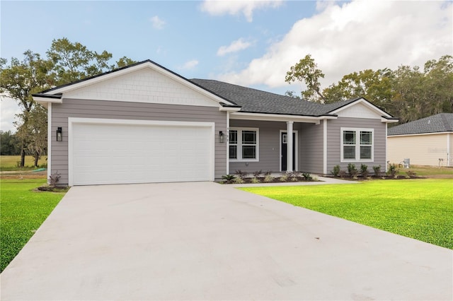 single story home featuring a garage, concrete driveway, a shingled roof, and a front lawn