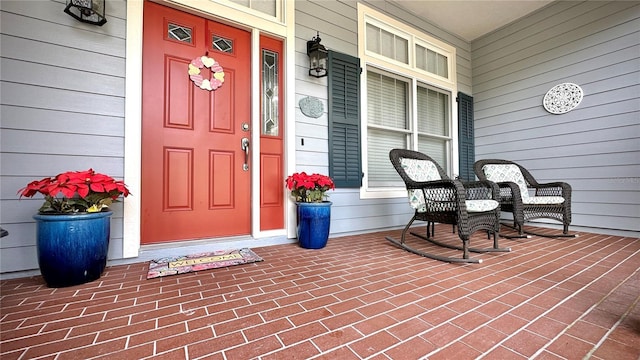 entrance to property with covered porch