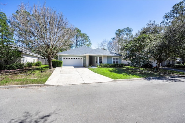 single story home featuring driveway, a garage, and a front lawn