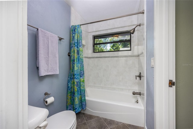 full bathroom with toilet, tile patterned flooring, and shower / bath combo