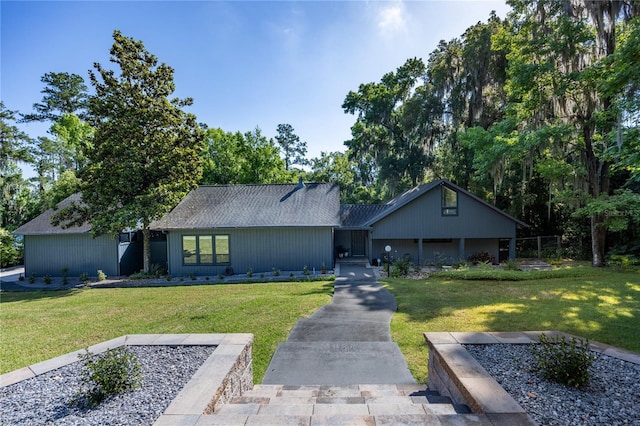 view of front of home with a front yard