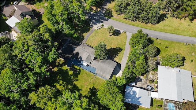 birds eye view of property with a residential view