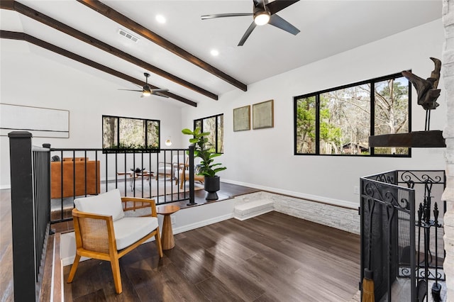 sitting room featuring recessed lighting, visible vents, lofted ceiling with beams, wood finished floors, and baseboards