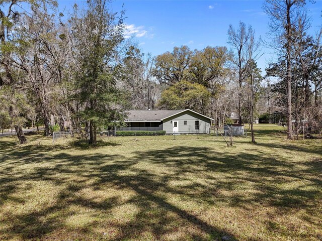 view of yard with fence