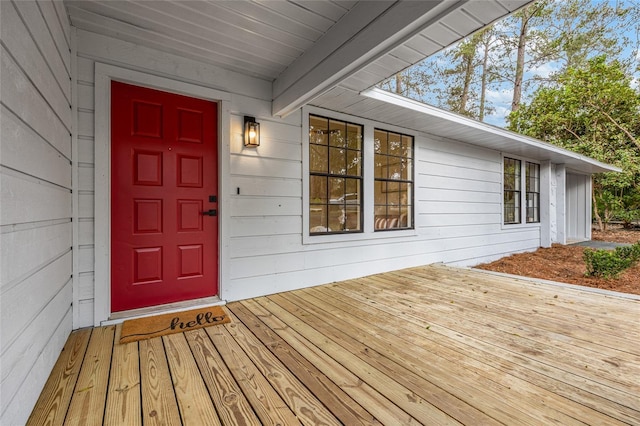 entrance to property with a wooden deck