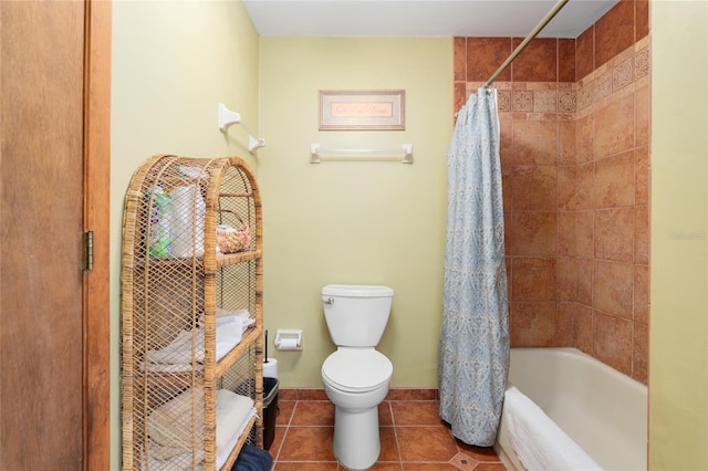 bathroom with shower / bath combination with curtain, tile patterned flooring, toilet, and baseboards