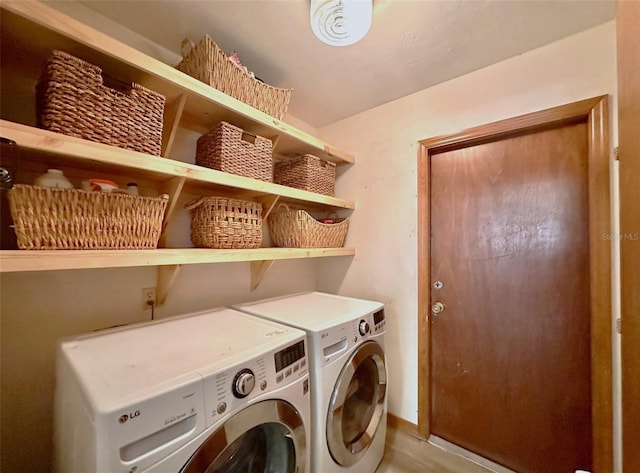 washroom with laundry area and washing machine and clothes dryer