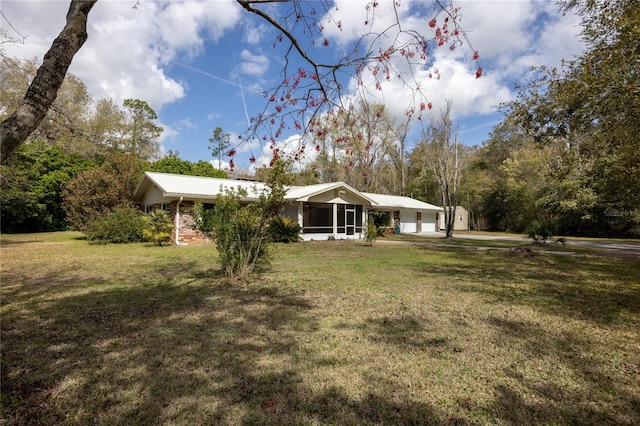 exterior space featuring a front lawn