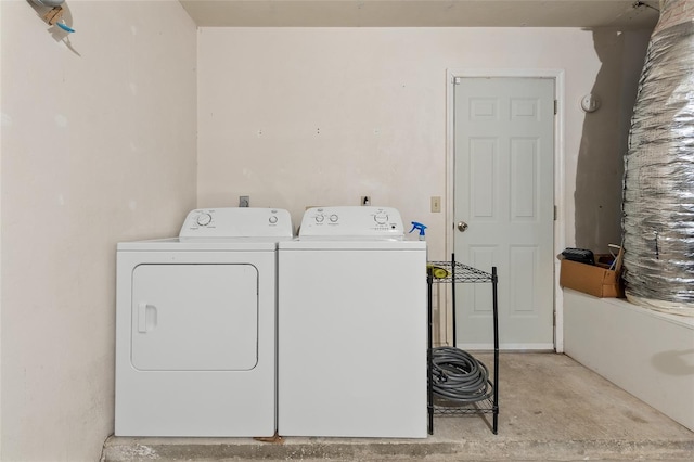 laundry area with laundry area and independent washer and dryer