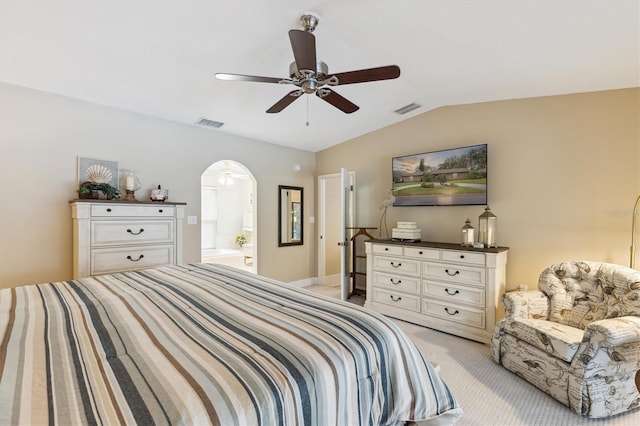 bedroom with light carpet, visible vents, vaulted ceiling, and a ceiling fan