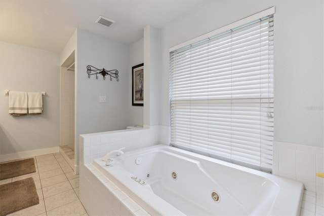 906 Crestview Dr, Auburndale, FL 33823 - full bathroom featuring a jetted tub and tile patterned flooring