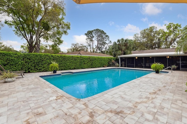 906 Crestview Dr, Auburndale, FL 33823 - view of pool with a sunroom and a patio area