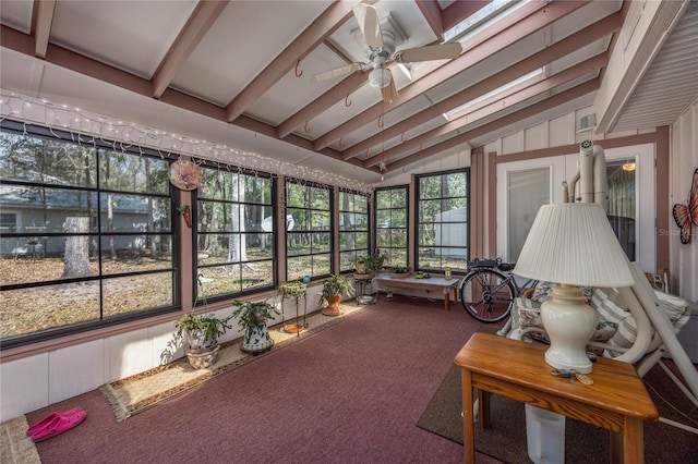 sunroom / solarium with vaulted ceiling with beams and ceiling fan