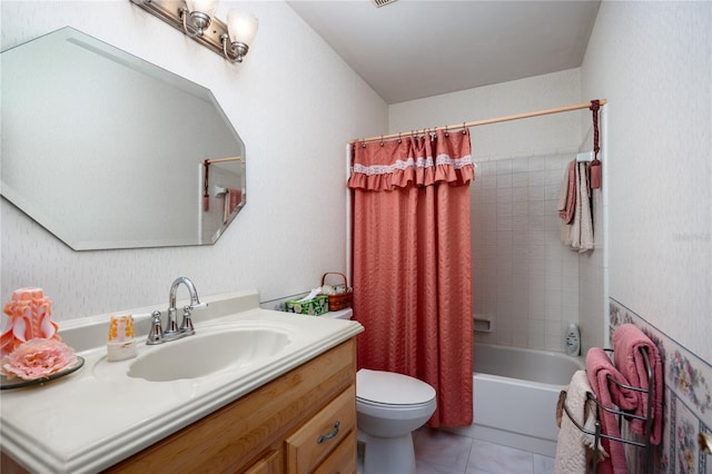 full bathroom with tile patterned flooring, vanity, toilet, and shower / bath combo