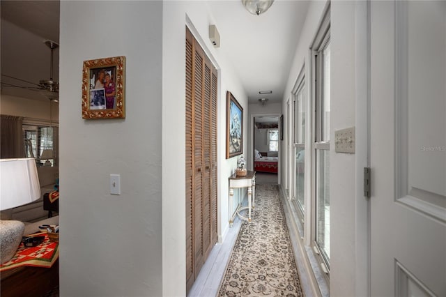 hallway featuring light wood-type flooring