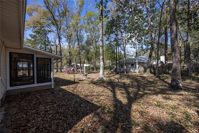 view of yard featuring fence