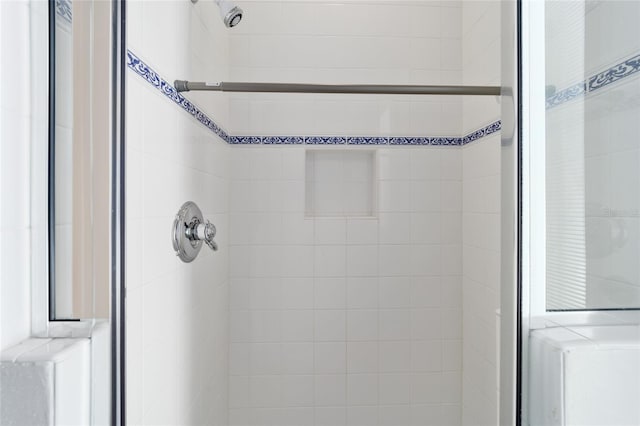 bathroom featuring a stall shower