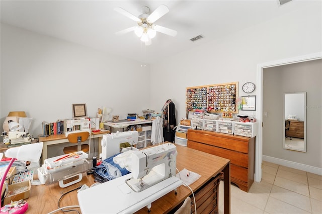 office with a ceiling fan, visible vents, baseboards, and light tile patterned floors